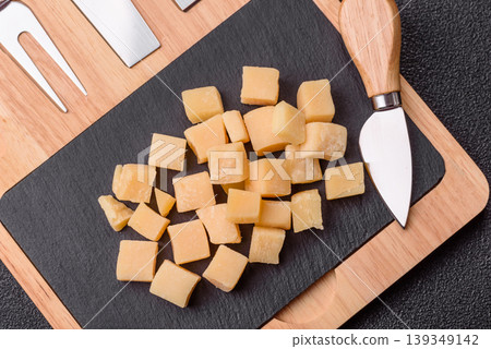 Parmesan cheese cubes for pasta, salads, and other Italian dishes. Parmesan cheese 139349142