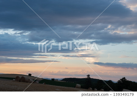Wheat roll on the hill at dusk Wheat roll on the hill at dusk 139349179