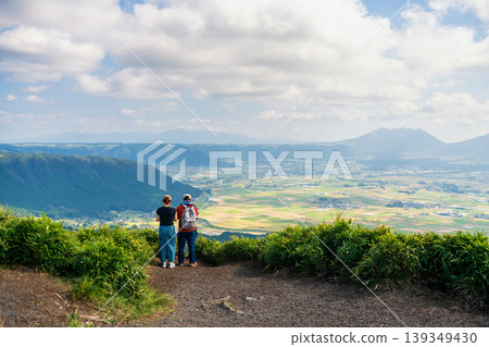 Japanese couple view mount Aso from Daikanbo observatory, Kumamoto 139349430