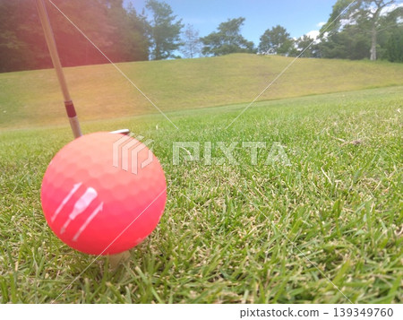 Green and red golf balls Green and red golf balls 139349760