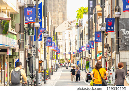 The streetscape of Kitashinagawa Hondori Shopping Street, a former post town in Shinagawa, Tokyo. The streetscape of Kitashinagawa Hondori Shopping Street, a former post town in Shinagawa, Tokyo. 139350395