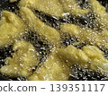Preparing bamboo shoot tempura 139351117