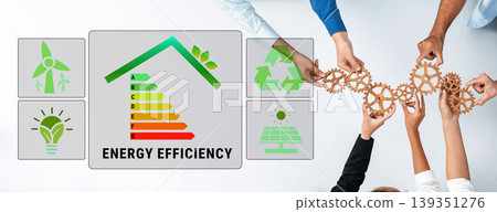 Hands Collaborating on Promoting Energy Efficiency with Eco-Friendly Icons and Gears Representing Sustainable Practices and Renewable Energy Solutions Quark Hands Collaborating on Promoting Energy Efficiency with Eco-Friendly Icons and Gears Representing Sustainable Practices and Renewable Energy Solutions Quark 139351276