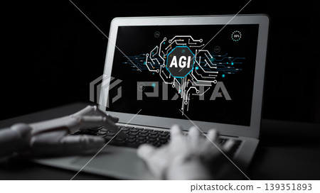 Artificial Intelligence Display on Laptop with Robotic Hand Representing Advanced General Intelligence Concept Haptic 139351893