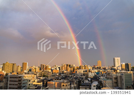 A large double rainbow and Tokyo Skytree stretching across a residential area of Tokyo. A large double rainbow and Tokyo Skytree stretching across a residential area of Tokyo. 139351941