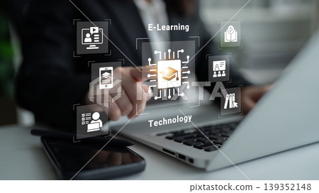 Business person interacting with digital e-learning icons on laptop screen to illustrate technology and education in modern workspace Cyphers. Business person interacting with digital e-learning icons on laptop screen to illustrate technology and education in modern workspace Cyphers. 139352148