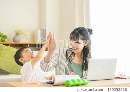 Moms and children working remotely Moms and children working remotely 139352628