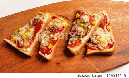 Two perfectly toasted pizza slices Two perfectly toasted pizza slices 139353349
