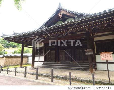 A stroll through Nara, touching the depths of its history. The imposing presence of the Todai-ji Temple's Great Bathhouse. A stroll through Nara, touching the depths of its history. The imposing presence of the Todai-ji Temple's Great Bathhouse. 139354614