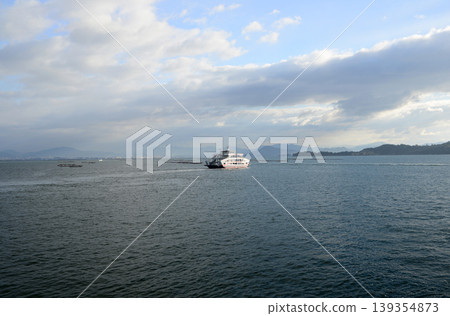 Ferry boat heading to Itsukushima Shrine on Miyajima Island in Aki Province 139354873