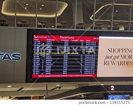 Airport electronic display board waiting for departure 139355273