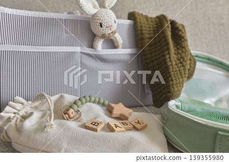 Baby organizer bag with toys and essentials Baby organizer bag with toys and essentials 139355980
