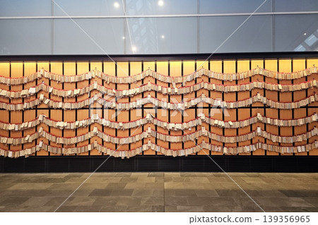 Close up Large wall covered in ema at Haneda Airport in Tokyo, Japan. Close up Large wall covered in ema at Haneda Airport in Tokyo, Japan. 139356965