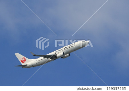 Airliner taking off and rising 139357265