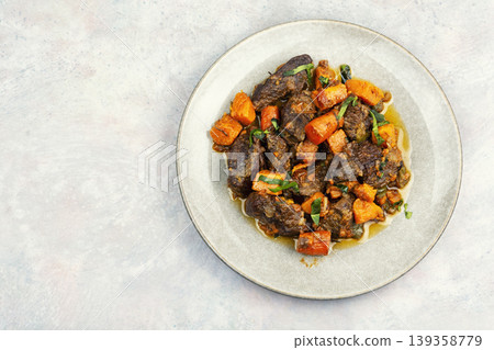 Slow cooked beef stew Slow cooked beef stew 139358779