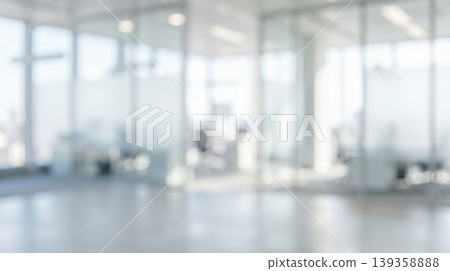 bright abstract defocused interior of modern contemporary corporate office building featuring glass partition walls empty desks and natural sunlight bright abstract defocused interior of modern contemporary corporate office building featuring glass partition walls empty desks and natural sunlight 139358888