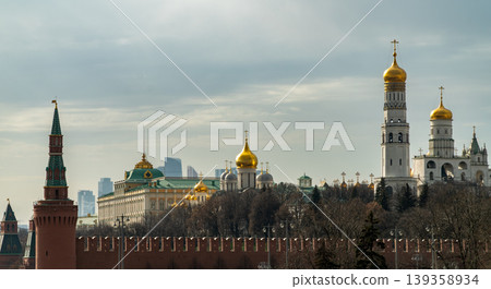 Moscow Kremlin Skyline With Golden Domes and Historic Cathedrals Behind Brick Wall Moscow Kremlin Skyline With Golden Domes and Historic Cathedrals Behind Brick Wall 139358934