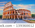 Colosseum at sunset with dramatic colorful sky in Rome, Italy 139360012