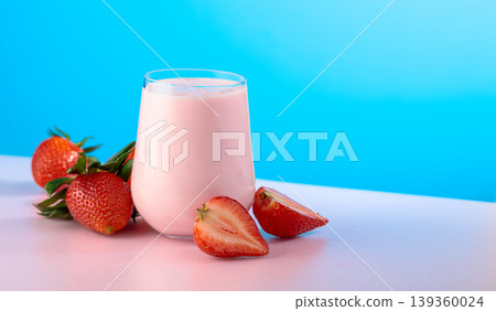 Strawberry yogurt and fresh berries on a colorful background. Strawberry yogurt and fresh berries on a colorful background. 139360024