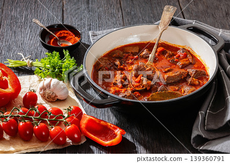 Beef goulash stew with paprika in ceramic pot Beef goulash stew with paprika in ceramic pot 139360791