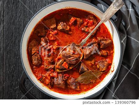 Beef goulash stew with paprika in ceramic pot Beef goulash stew with paprika in ceramic pot 139360796