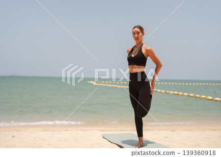Fit woman practicing yoga on beach, outdoor Fitness and Healthy Lifestyle Concept. Fit woman practicing yoga on beach, outdoor Fitness and Healthy Lifestyle Concept. 139360918