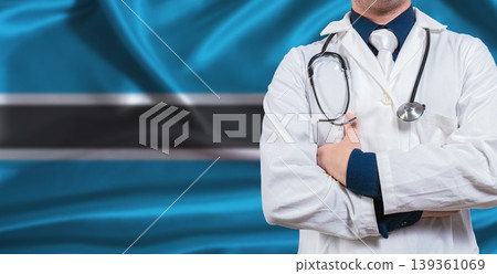 Male doctor with stethoscope on Botswanan flag. Doctor holding stethoscope on Botswana flag Male doctor with stethoscope on Botswanan flag. Doctor holding stethoscope on Botswana flag 139361069