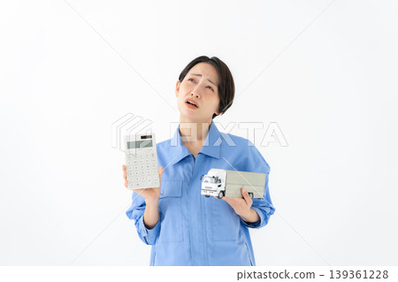 Women in work clothes Women in work clothes 139361228