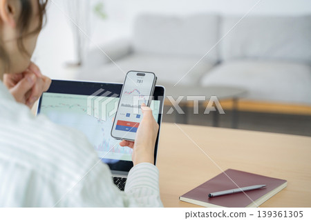 Investing woman Investing woman 139361305