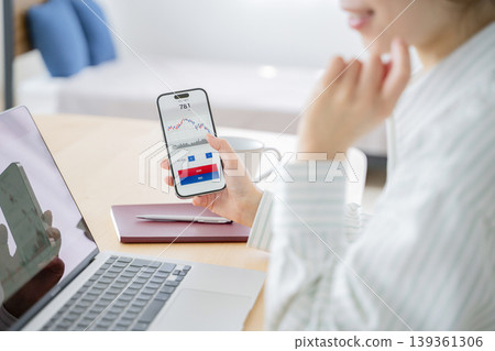 Investing woman Investing woman 139361306