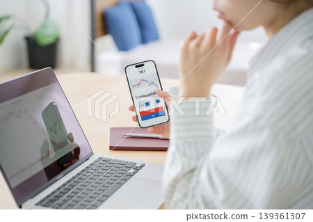 Investing woman Investing woman 139361307