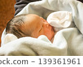 Newborn baby, 2 days old, breast enhancement 139361961