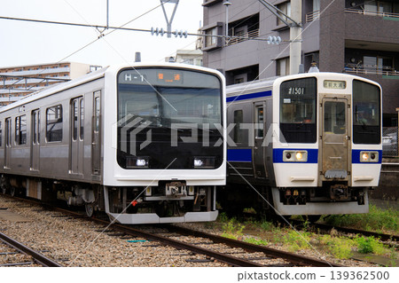 501 series and 415 series trains lined up at Minami-Fukuoka train depot 139362500