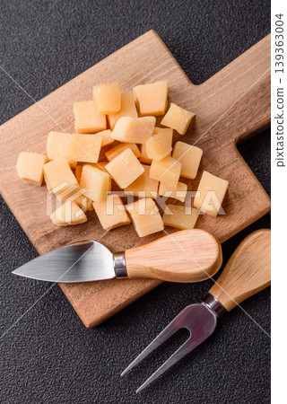 Parmesan cheese cubes for pasta, salads, and other Italian dishes. Parmesan cheese 139363004