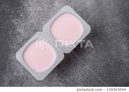 Milky liquid drinking yogurt, a useful food for healthy digestion. Drinking yogurt Milky liquid drinking yogurt, a useful food for healthy digestion. Drinking yogurt 139363044