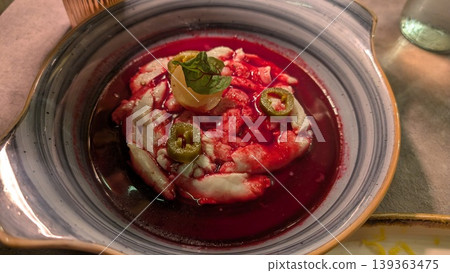Blood orange ceviche with pickled jalapenos and pickled pecoros Blood orange ceviche with pickled jalapenos and pickled pecoros 139363475