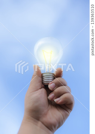 Renewable energy concept Earth Day or environment protection Hands protect forests that grow on the ground and help save the world. 139363510