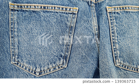 Back of blue jeans with pockets, denim background Back of blue jeans with pockets, denim background 139363715