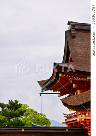 Close-up view of Fushimi Inari Taisha(Fushimi Inari Shrine) is a popular tourist destination in Kyoto, Japan. Fushimi Inari Shrine architecture. Building exterior. Close-up view of Fushimi Inari Taisha(Fushimi Inari Shrine) is a popular tourist destination in Kyoto, Japan. Fushimi Inari Shrine architecture. Building exterior. 139363787