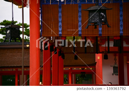 Close-up view of Fushimi Inari Taisha(Fushimi Inari Shrine) is a popular tourist destination in Kyoto, Japan.  Fushimi Inari Shrine architecture. Building exterior. 139363792