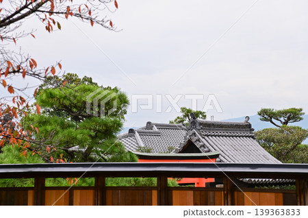 The nature view from Fushimi Inari Taisha(Fushimi Inari Shrine) in Kyoto, Japan. Fushimi Inari Shrine is a popular tourist destination. Stunning nature view of Kyoto. Trees, sky and architecture. The nature view from Fushimi Inari Taisha(Fushimi Inari Shrine) in Kyoto, Japan. Fushimi Inari Shrine is a popular tourist destination. Stunning nature view of Kyoto. Trees, sky and architecture. 139363833