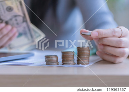woman working from home concept saving money for finance accounting. woman working from home concept saving money for finance accounting. 139363867