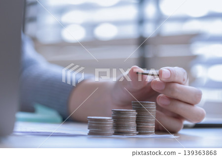 woman working from home concept saving money for finance accounting. woman working from home concept saving money for finance accounting. 139363868