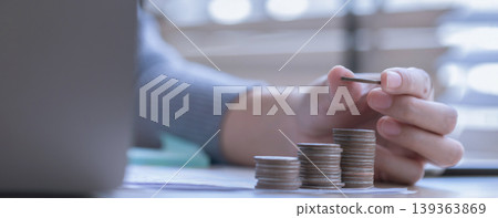woman working from home concept saving money for finance accounting. woman working from home concept saving money for finance accounting. 139363869