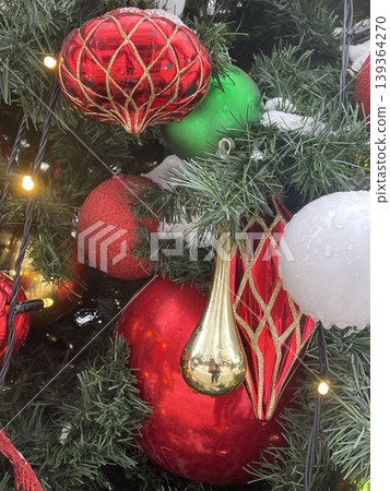 Christmas tree decorated with red, green, gold ornaments and lights, perfect festive background Christmas tree decorated with red, green, gold ornaments and lights, perfect festive background 139364270