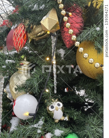 Christmas tree decorated with colorful ornaments and lights creating festive background Christmas tree decorated with colorful ornaments and lights creating festive background 139364271