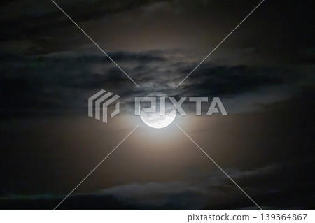 The moon hidden in the clouds The moon hidden in the clouds 139364867