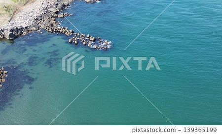 Aerial view of the natural scenery of the Bishabetsu River estuary in Hamamasu and the Sea of Japan, Ishikari City, Hokkaido. 139365199