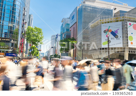 Crowded crowds at Sukiyabashi intersection in Ginza, Tokyo. Crowded crowds at Sukiyabashi intersection in Ginza, Tokyo. 139365263
