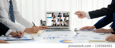 Business people on video conference for brisk virtual group meeting Business people on video conference for brisk virtual group meeting 139366992